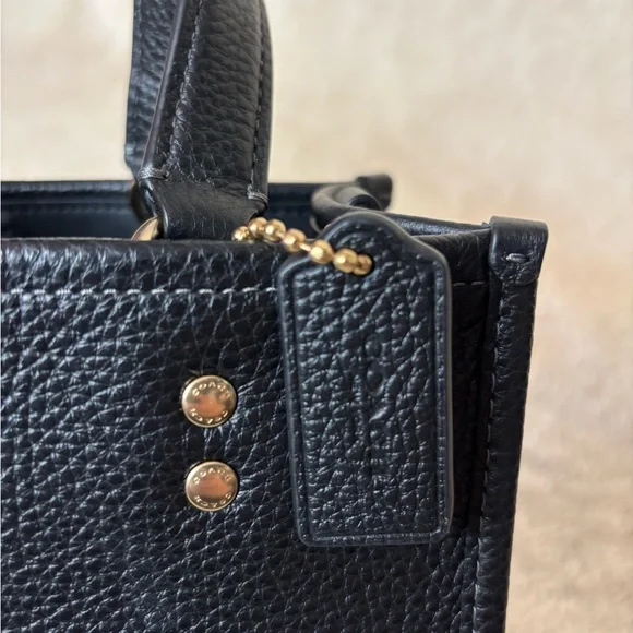 Coach Dempsey leather bag